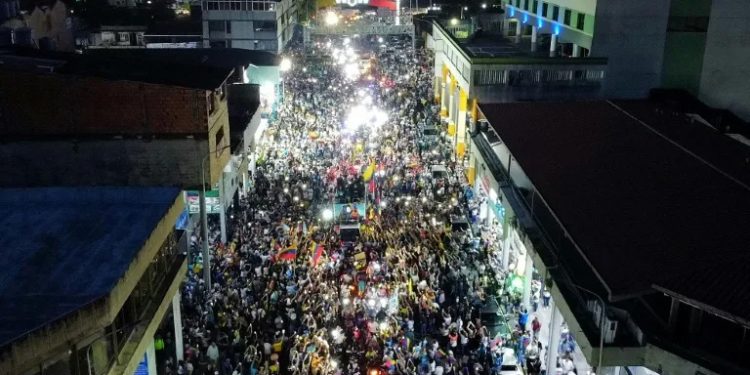 Venezuela opposition hold defiant rally one month before election