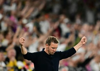 Euro hosts Germany pass Denmark test but clouds remain