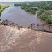 Midwestern flooding collapses a bridge, forces evacuations and kills at least 2