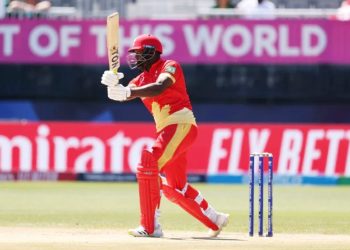 In the runs: Aaron Johnson on his way to his half-century on Tuesday Pic: AFP