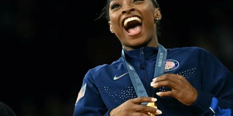 Biles inspires USA to Olympic gold as Irish swimmer makes history