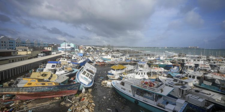 Fishing vessels lie damaged after Hurricane Beryl passed through the Bridgetown Fisheries in Barbados, Monday, July 1, 2024. (AP Photo/Ricardo Mazalan)ASSOCIATED PRESS