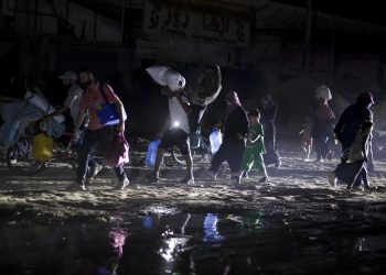 Palestinians displaced by the Israeli air and ground offensive on the Gaza Strip flee from parts of Khan Younis following an evacuation order by the Israeli army to leave the eastern part of Gaza Strip's second largest city on Monday, July 1, 2024. (AP Photo/Jehad Alshrafi)ASSOCIATED PRESS
