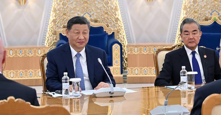 China's President Xi Jinping and Foreign Minister Wang Yi attend a meeting with Kazakhstan's President Kassym-Jomart Tokayev in Astana, Kazakhstan July 3, 2024. Press Service of the President of Kazakhstan/Handout via REUTERS