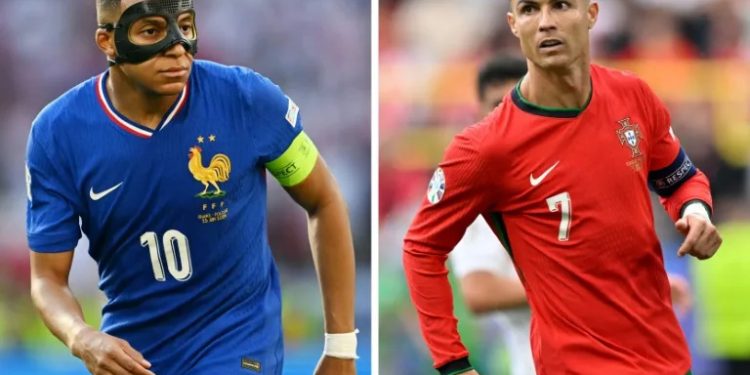 Kylian Mbappe and Cristiano Ronaldo will lead France and Portugal into their Euro 2024 quarter-final clash in Hamburg on Friday (Ozan KOSE)/AFP