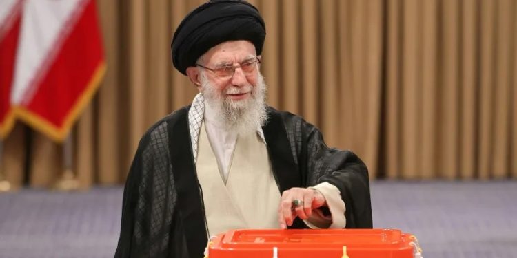 Calling for better ties with West, Iran reformist wins presidency