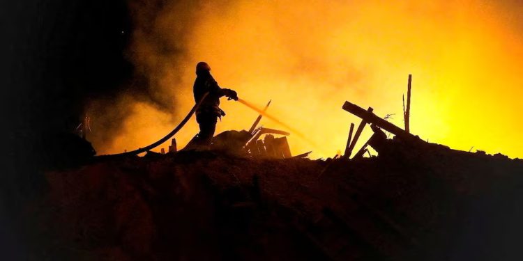 This video grab shows Mohammed Abu Selmia, the director of Gaza's main hospital, who was detained by Israeli forces in November, sitting with his family after his release, along with other detainees, at a hospital in Khan Younis, Gaza Strip on Monday, July 1, 2024. Israel released the director of Gaza's main hospital on Monday after holding him for seven months without charge or trial over allegations the facility had been used as a Hamas command center. He said he and other detainees were held under harsh conditions and tortured. (AP Photo/Mohammad Jahjouh)ASSOCIATED PRESS