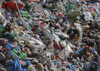 Mount Everest’s highest camp is littered with frozen garbage, and cleanup is likely to take years