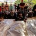 Mourners grieve next to the bodies of Palestinians killed in Israeli strikes, amid the Israel-Hamas conflict, at Nasser hospital in Khan Younis in the southern Gaza Strip, August 28, 2024. REUTERS/Hussam Al-Masri