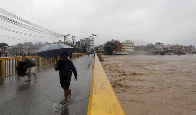 Nepal closes schools after heavy rains kill 100