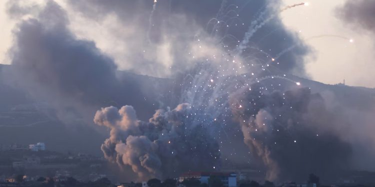 In pictures: Israel strikes hundreds of Hezbollah targets in Lebanon