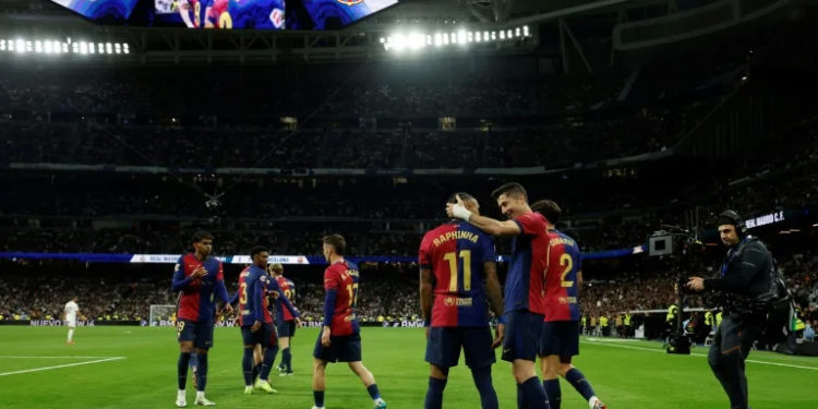 Lewandowski double as Barca shred Madrid in La Liga Clasico