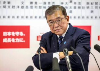 Japan PM vows to stay on despite election debacle