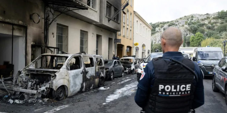 France vows to step up drugs fight after police vehicles torched