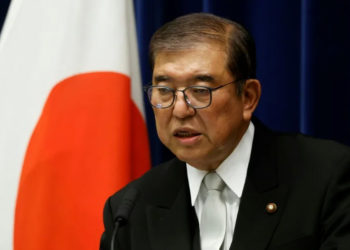 Japanese Prime Minister Shigeru Ishiba expressed concern over South China Sea tensions in a meeting with Chinese President Xi Jinping (Kiyoshi Ota) (Kiyoshi Ota/POOL/AFP)