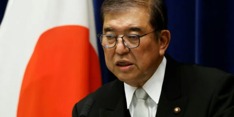 Japanese Prime Minister Shigeru Ishiba expressed concern over South China Sea tensions in a meeting with Chinese President Xi Jinping (Kiyoshi Ota) (Kiyoshi Ota/POOL/AFP)