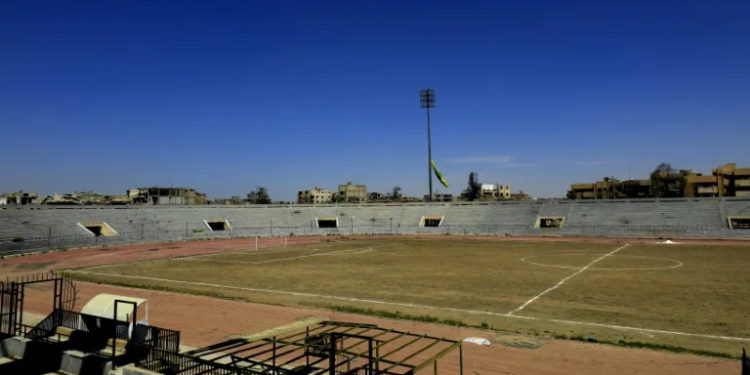 Prisoners had scrawled messages on the walls of the jail inside the Raqa stadium (Delil souleiman) (Delil souleiman/AFP/AFP)