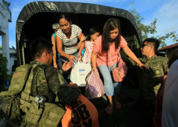 Tens of thousands flee as Super Typhoon Man-yi nears Philippines