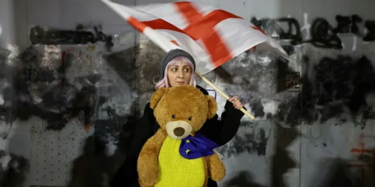Georgia ruling party set to install loyalist president amid constitutional crisis