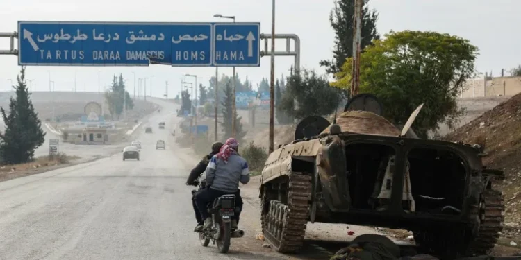 Rebels declare end of Assad rule in Syria