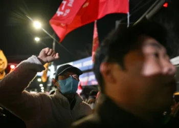 South Korean president pressed to step down over martial law bid