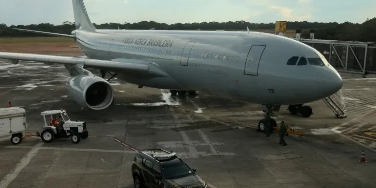 Brazil slams US after dozens of deportees arrive handcuffed