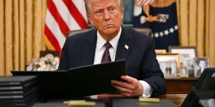 Trump takes US reins with flurry of executive orders