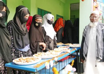 Mirpur’s Serampur Mojaddediya Dakhil Madrasa is filled with traditional pitha festival