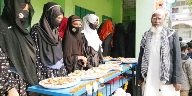 Mirpur’s Serampur Mojaddediya Dakhil Madrasa is filled with traditional pitha festival