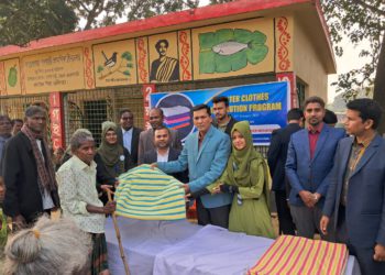 HTI distributes warm clothes among the minority groups in Godagari
