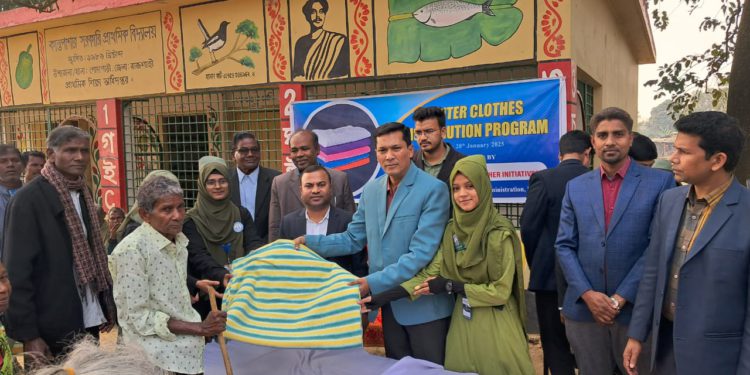 HTI distributes warm clothes among the minority groups in Godagari