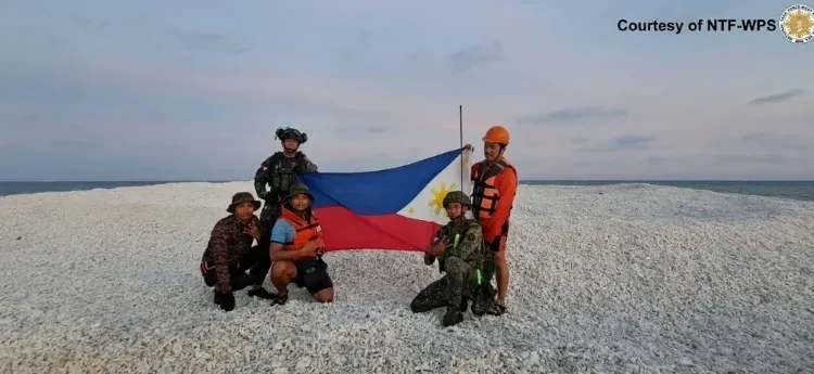 China, Philippines trade barbs over disputed reef