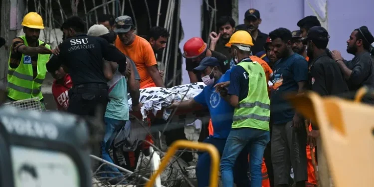 Search continues after Pakistan building collapse kills 14