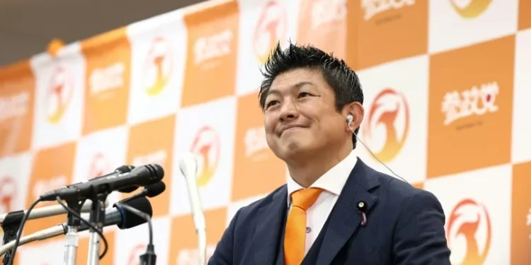 Japan PM hangs on after election debacle