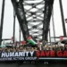 Assange joins pro-Palestinian protest on Sydney Harbour Bridge