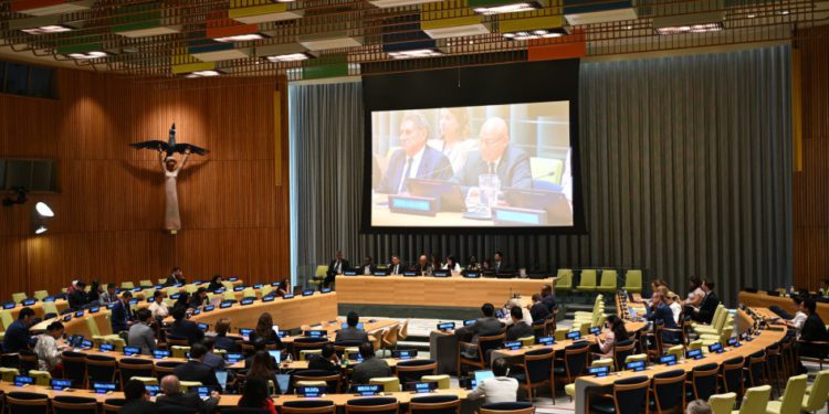 UN Climate Chief Says Faster Energy Transition Is Key to National Security